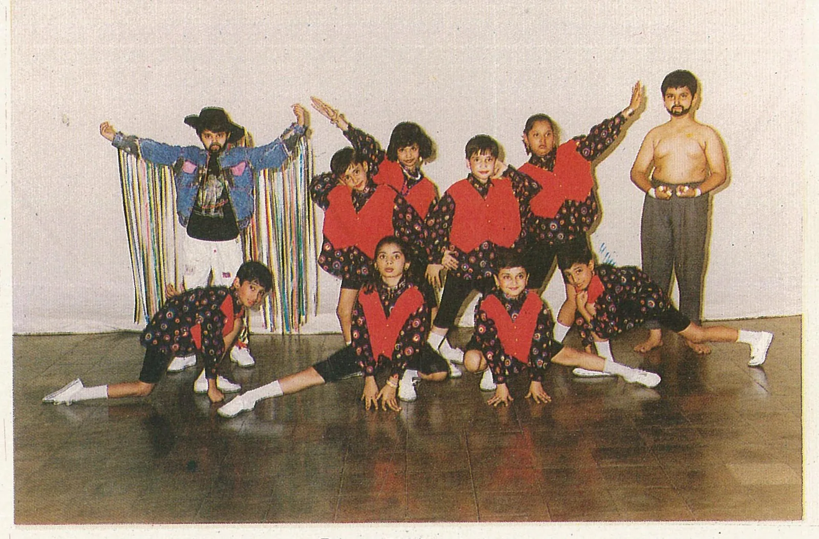 Children arranged in a dance pose for an annual day performance