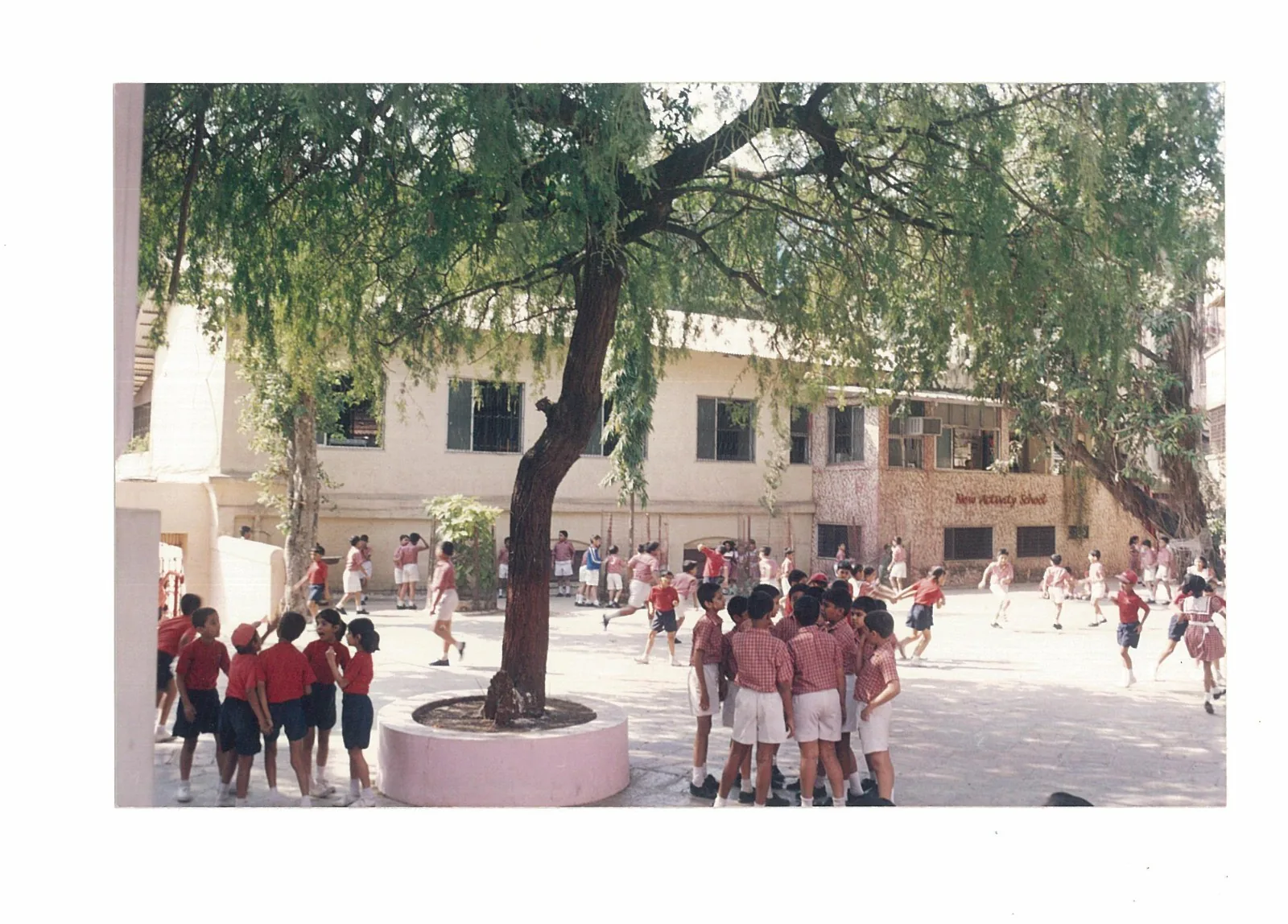 NAS children gathered in the New Activity School courtyard